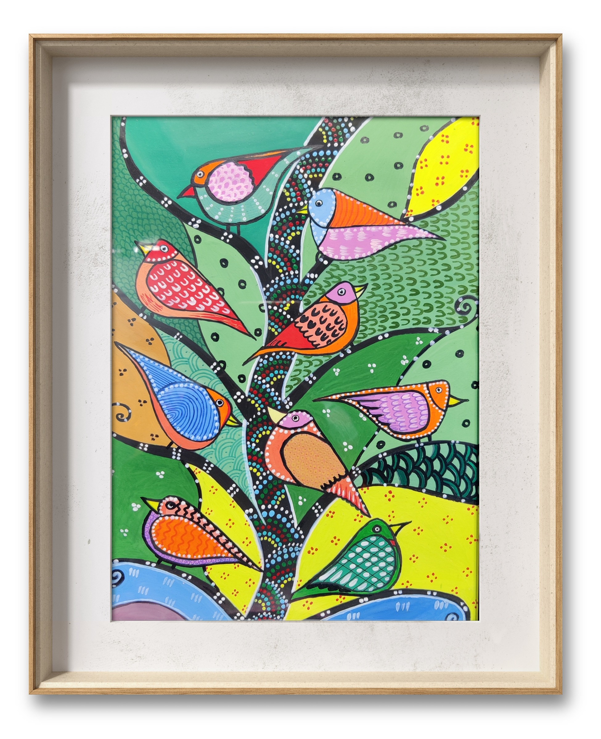 Six brightly patterned birds nesting in a green tree, presented in a wooden frame.