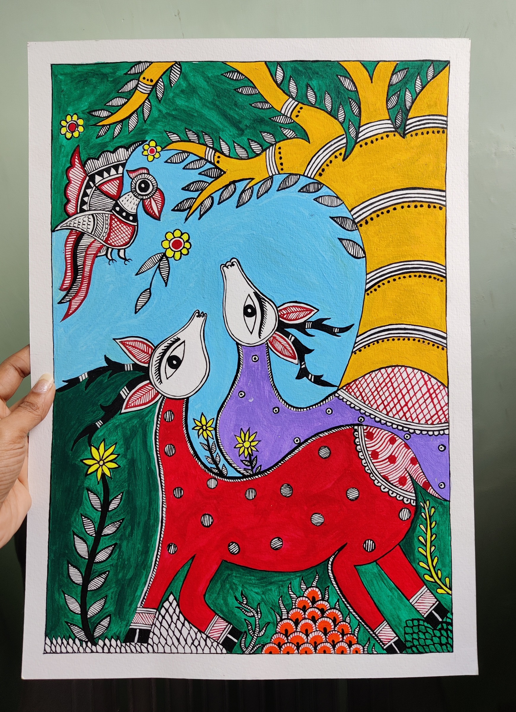 A pair of deer beneath a flowering tree. The Sanskrit title means 'pair of deer'.